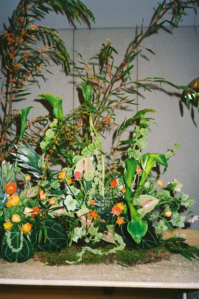 A lush tropical foliage and flower installation